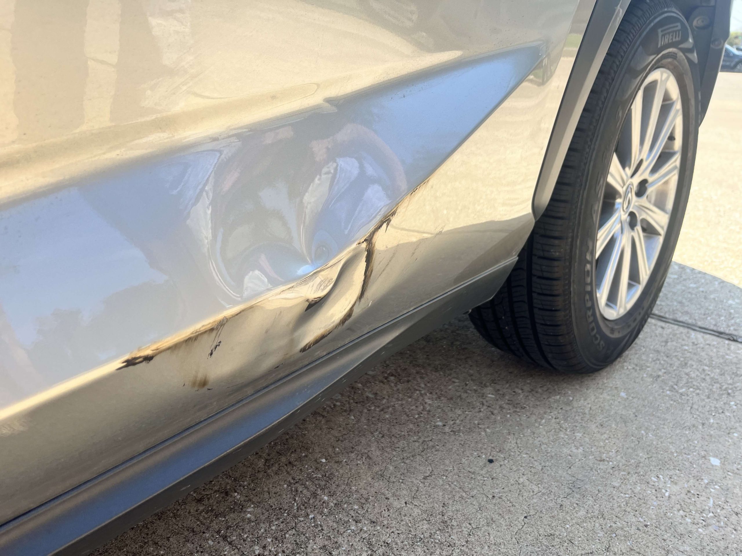 big dent in the side of a car